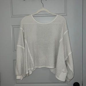 White sweater with open back oversized look